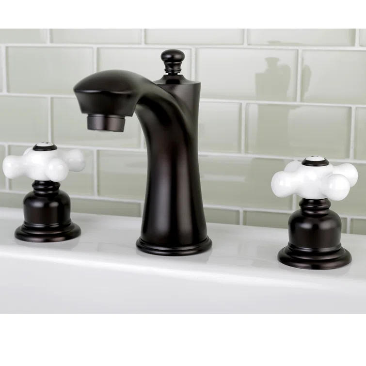 Kingston Brass Victorian Two-Handle 3-Hole Deck Mount Widespread Bathroom Faucet with Retail Pop-Up Drain