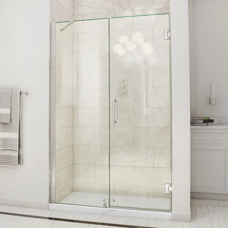 Unidoor 57" W x 72" H Hinged Frameless Shower Door and Fixed Panel with ClearMax Glass Treatment