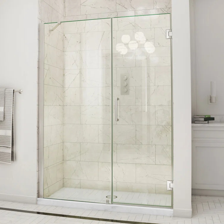 Unidoor 57" W x 72" H Hinged Frameless Shower Door and Fixed Panel with ClearMax Glass Treatment