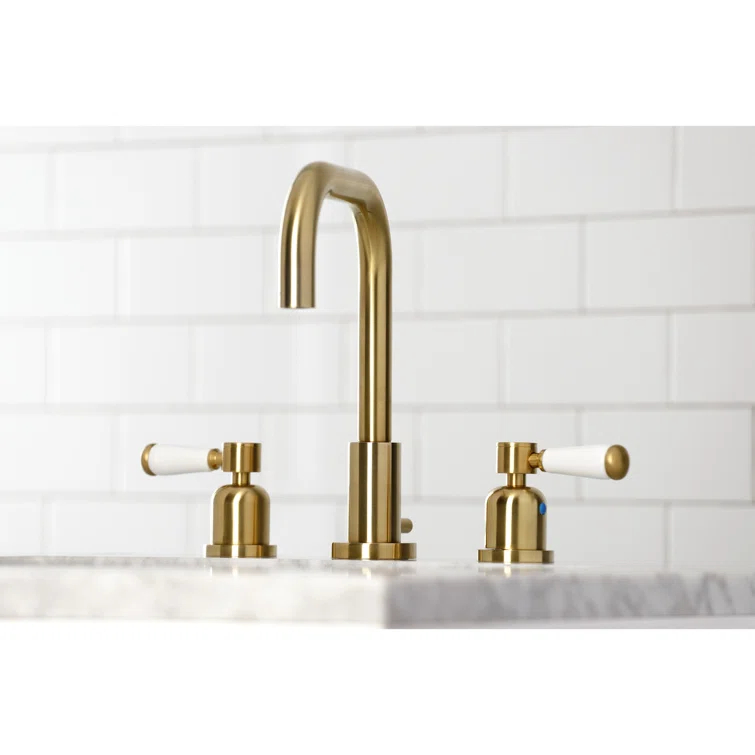 Kingston Brass Two-Handle 3-Hole Deck Mount Widespread Bathroom Faucet with Brass Pop-Up Drain