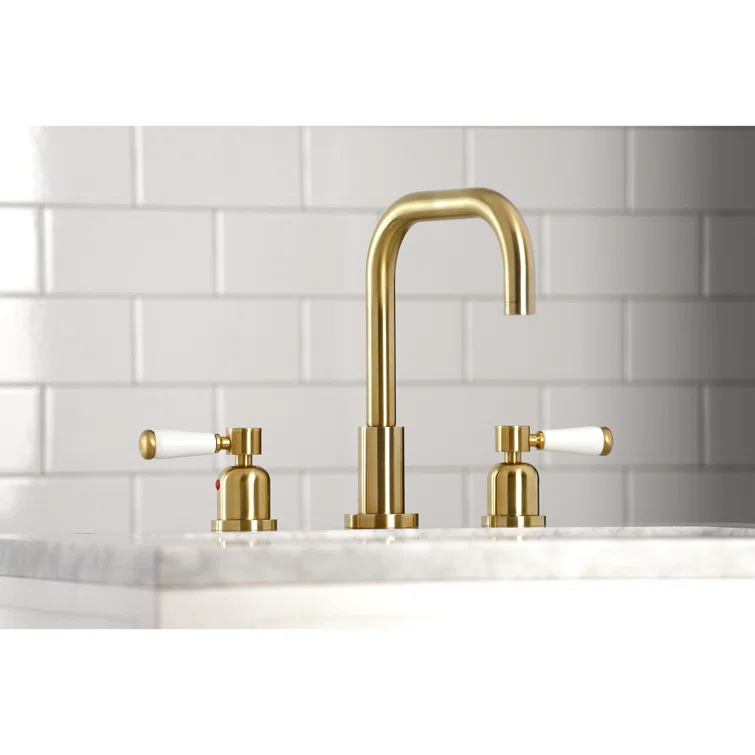 Kingston Brass Two-Handle 3-Hole Deck Mount Widespread Bathroom Faucet with Brass Pop-Up Drain