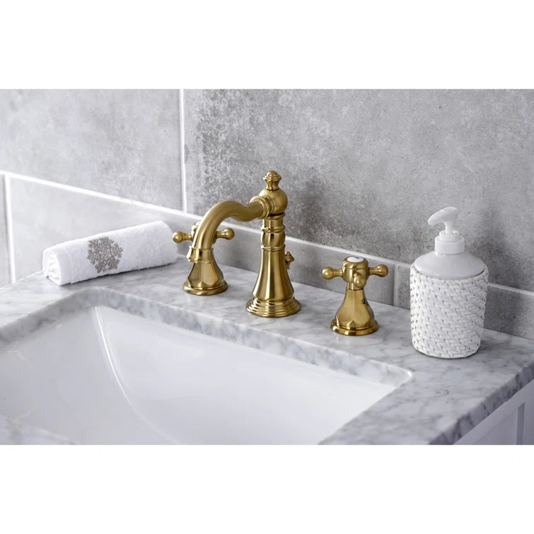 Kingston Brass Metropolitan Two-Handle 3-Hole Deck Mount Widespread Bathroom Faucet with Pop-Up Drain