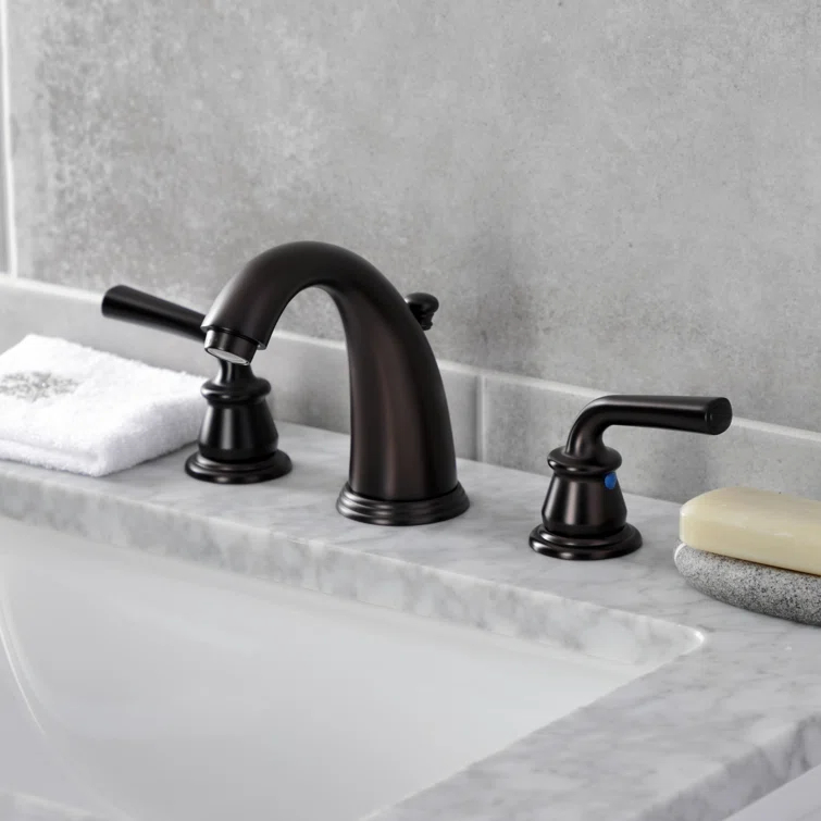 Kingston Brass Restoration Two-Handle 3-Hole Deck Mount Widespread Bathroom Faucet with Retail Pop-Up Drain