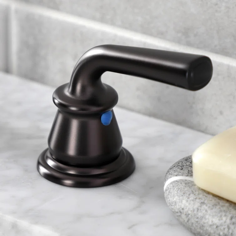 Kingston Brass Restoration Two-Handle 3-Hole Deck Mount Widespread Bathroom Faucet with Retail Pop-Up Drain
