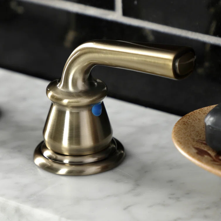 Kingston Brass Restoration Two-Handle 3-Hole Deck Mount Widespread Bathroom Faucet with Retail Pop-Up Drain