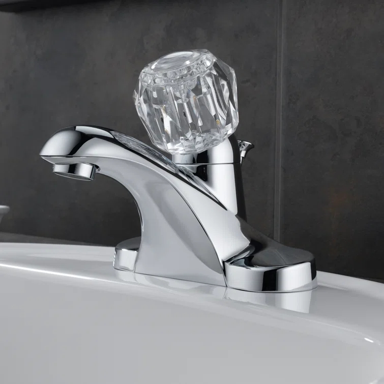 Foundations Centerset Bathroom Faucet with Single Push Tilt Handle