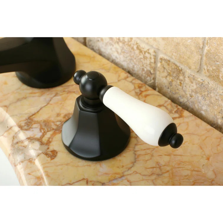 Kingston Brass Metropolitan Two-Handle 3-Hole Deck Mount Widespread Bathroom Faucet with Brass Pop-Up Drain