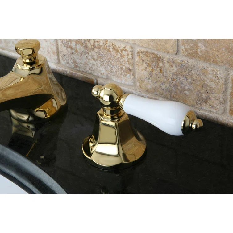 Kingston Brass Metropolitan Two-Handle 3-Hole Deck Mount Widespread Bathroom Faucet with Brass Pop-Up Drain