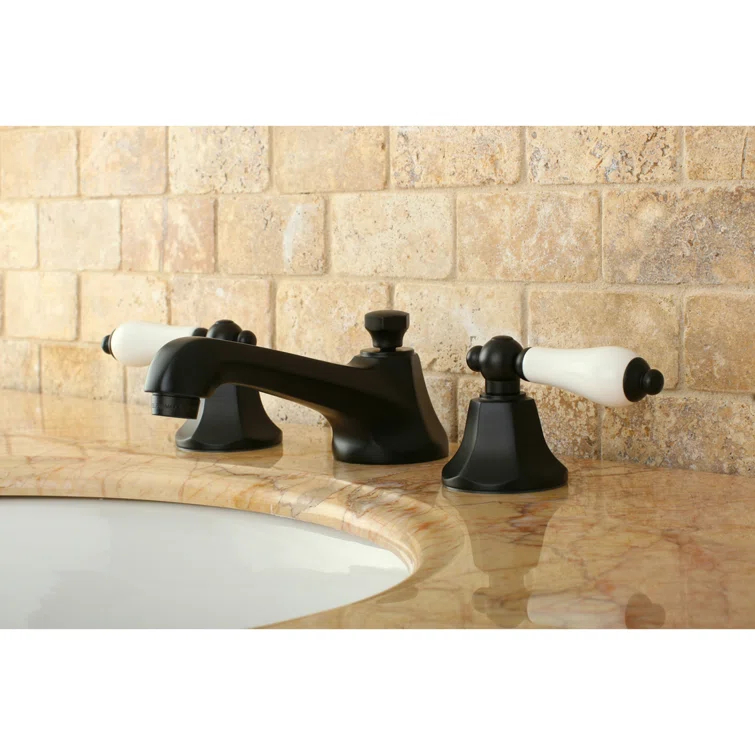 Kingston Brass Metropolitan Two-Handle 3-Hole Deck Mount Widespread Bathroom Faucet with Brass Pop-Up Drain