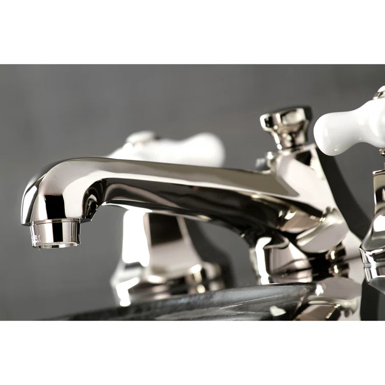 Kingston Brass Metropolitan Two-Handle 3-Hole Deck Mount Widespread Bathroom Faucet with Brass Pop-Up Drain