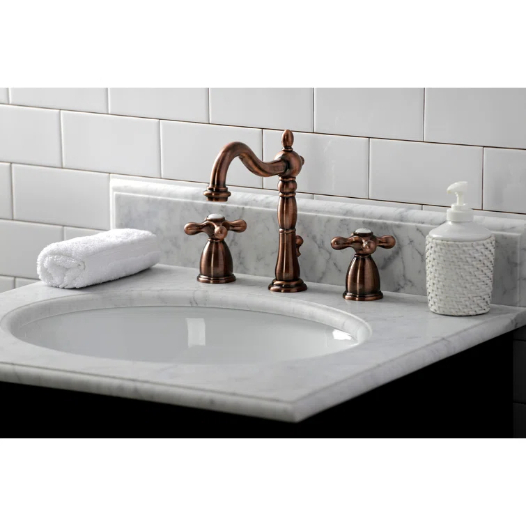 Kingston Brass Heritage Two-Handle 3-Hole Deck Mount Widespread Bathroom Faucet with Pop-Up Drain