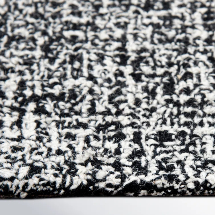 Britley Handmade Tufted Wool Black/White Area Rug