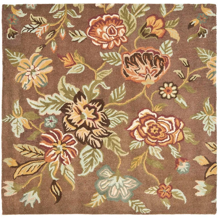 Emrick Hand Hooked Wool/Cotton/Latex Floral Rug in Brown