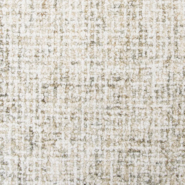 Britley Handmade Tufted Wool Beige Area Rug