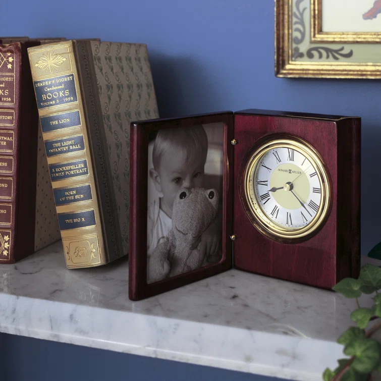 Howard Miller® Portrait Traditional Roman Numeral Quartz Movement / Crystal Tabletop Clock in Rosewood Hall/Polished Brass