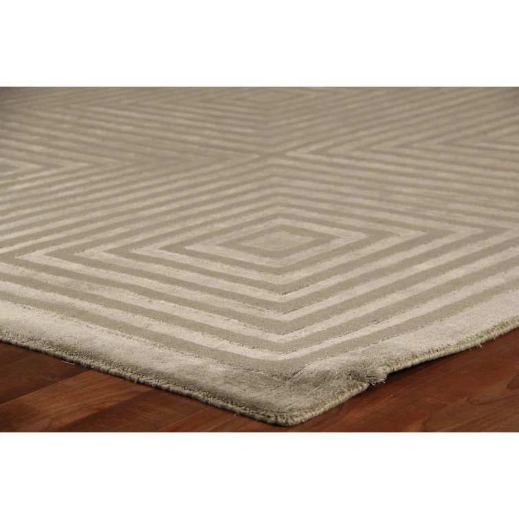 Dove Embossed Geometric Hand-Loomed Dark Gray Area Rug