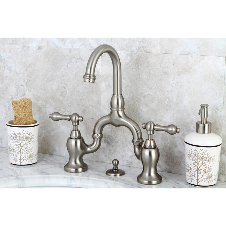 Kingston Brass English Country Two-Handle 3-Hole Deck Mount Bridge Bathroom Faucet with Brass Pop-Up