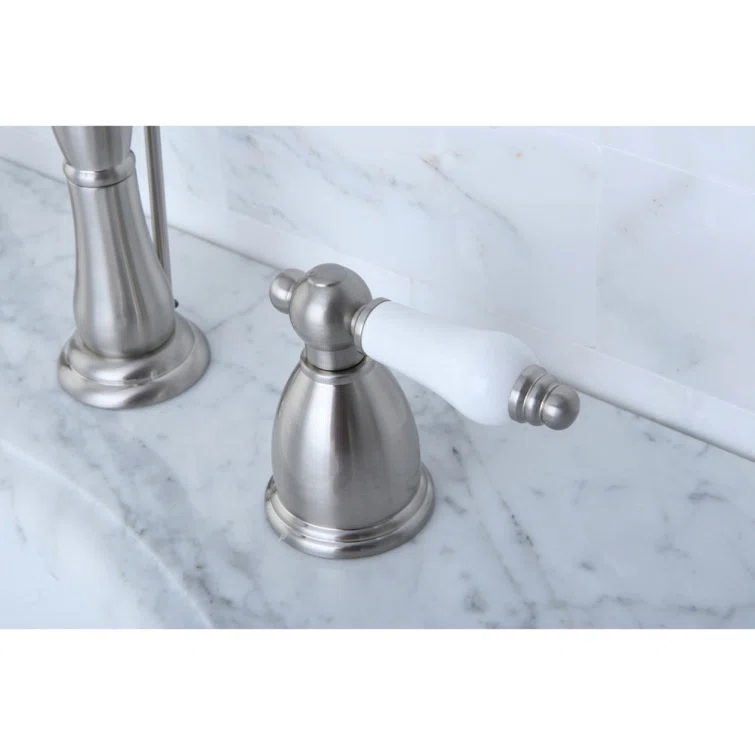 Kingston Brass Heritage Two-Handle 3-Hole Deck Mount Widespread Bathroom Faucet with Pop-Up Drain