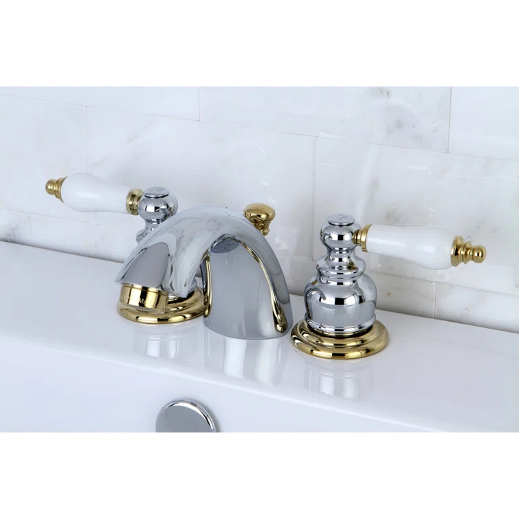 Kingston Brass Victorian Two-Handle 3-Hole Deck Mount Mini-Widespread Bathroom Faucet with Plastic Pop-Up