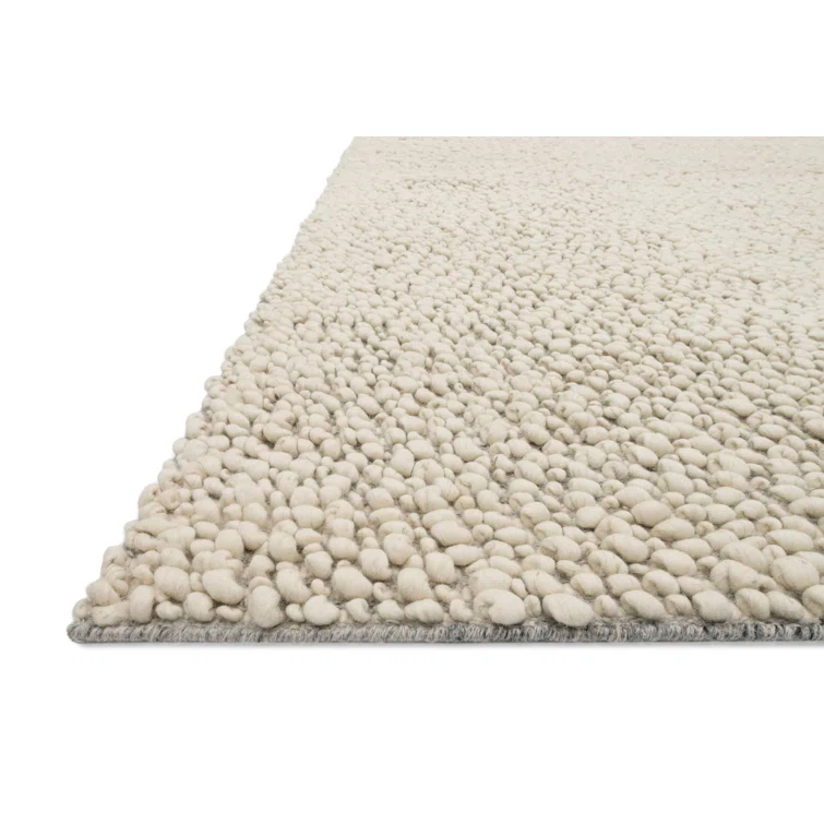 Handmade Ivory Wool Rectangular 5' x 7' Area Rug