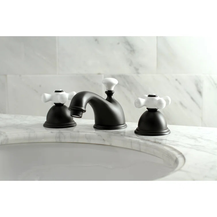 Kingston Brass Restoration Two-Handle 3-Hole Deck Mount Widespread Bathroom Faucet with Brass Pop-Up Drain