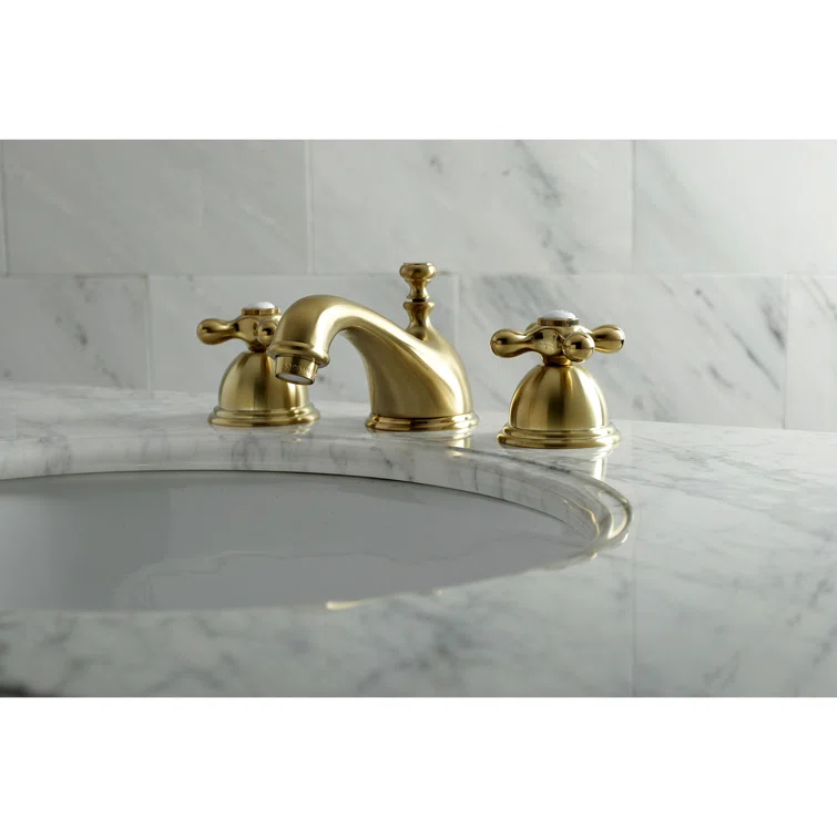 Kingston Brass Duchess Two-Handle 3-Hole Deck Mount Widespread Bathroom Faucet with Brass Pop-Up Drain