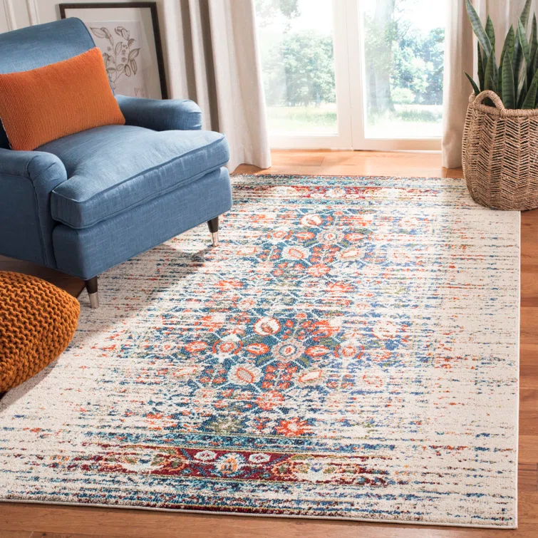 Hertzler Floral Ivory/Blue Area Rug