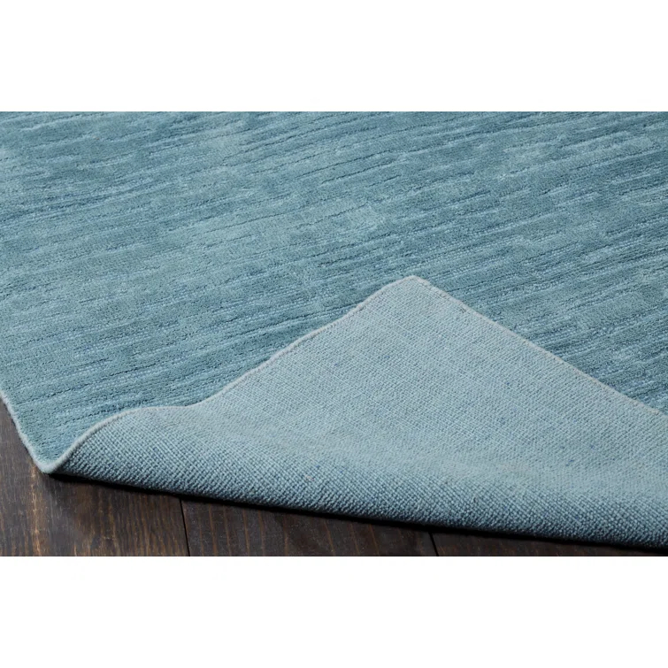 Kozeroff Blue Area Rug