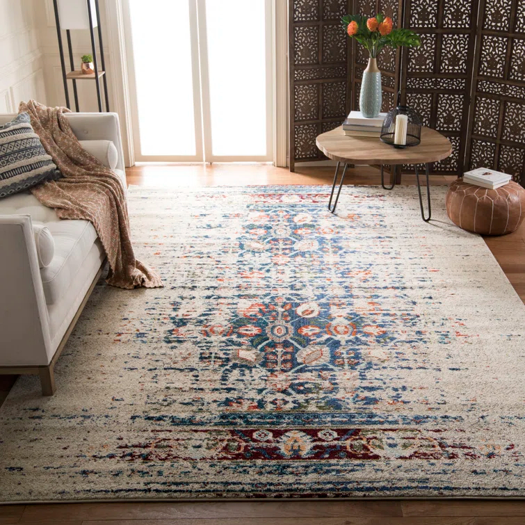 Hertzler Floral Ivory/Blue Area Rug