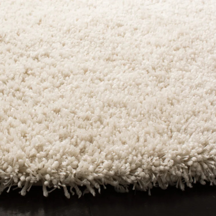 Assar Handmade Shag Ivory Rug