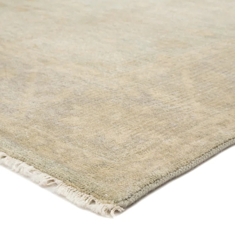 Eloquent Wool Oriental Area Rug in Beige