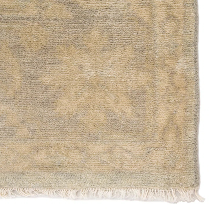 Eloquent Wool Oriental Area Rug in Beige
