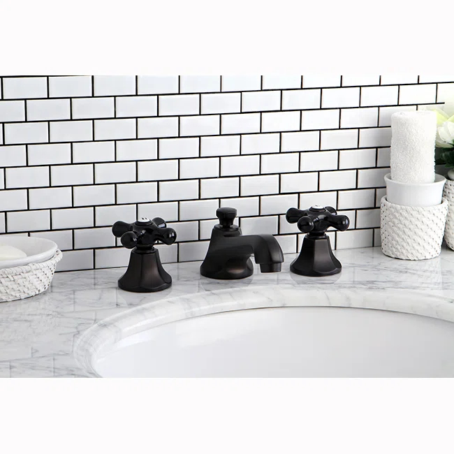 Kingston Brass Duchess Two-Handle 3-Hole Deck Mount Widespread Bathroom Faucet with Brass Pop-Up Drain