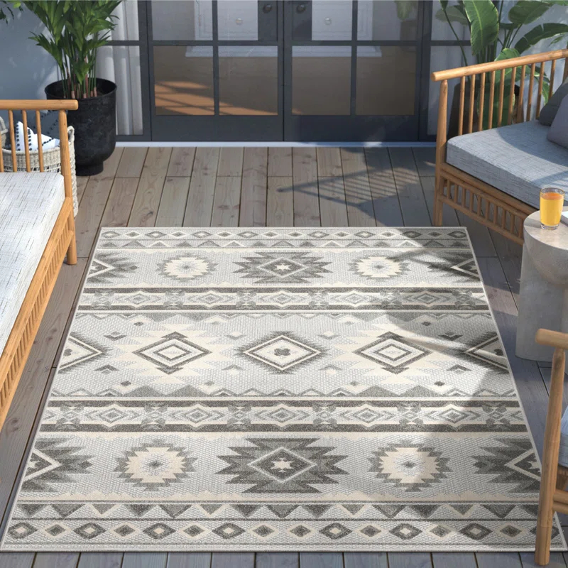 Ebern Designs Dickenson Mamba Geometric Grey Indoor/Outdoor Hi-Lo Area Rug