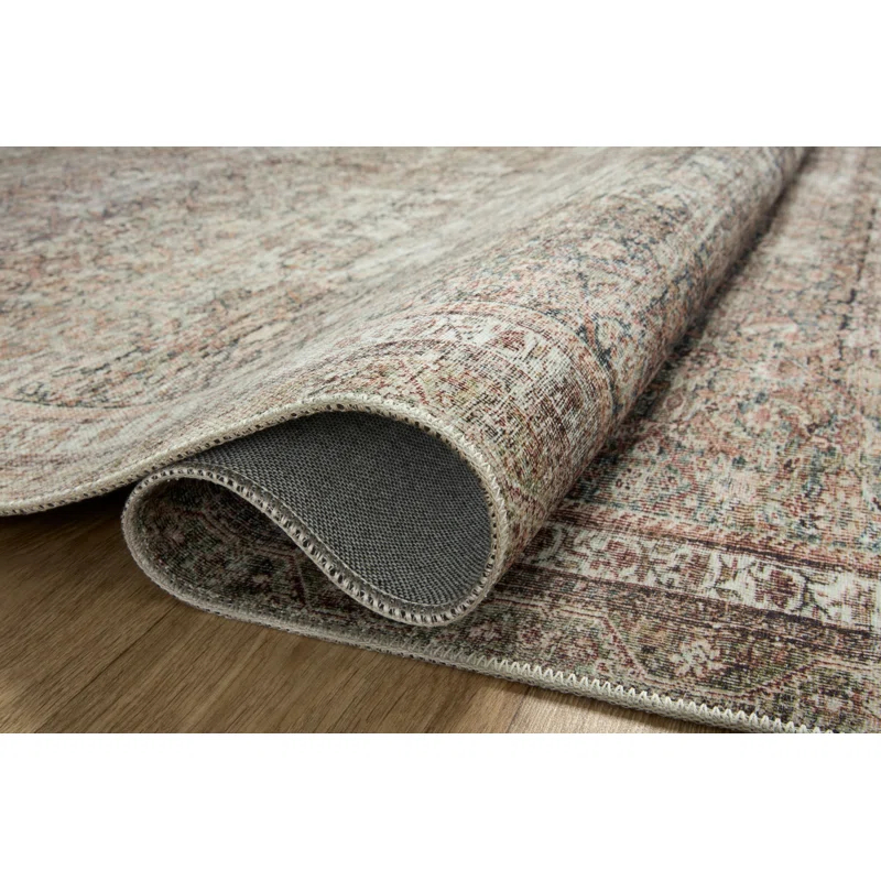 Jules Oriental Power Loomed Polyester Area Rug in Ink / Terracotta