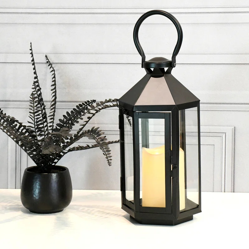 The Holiday Aisle® Black Hexagon Metal Lantern with Battery-Operated Candle