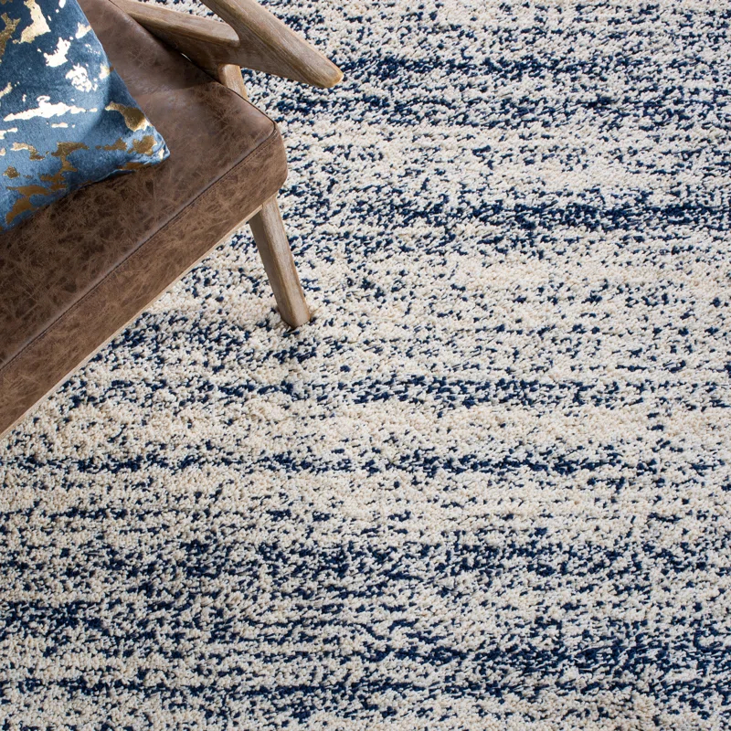 Audriauna Ivory/Navy Area Rug