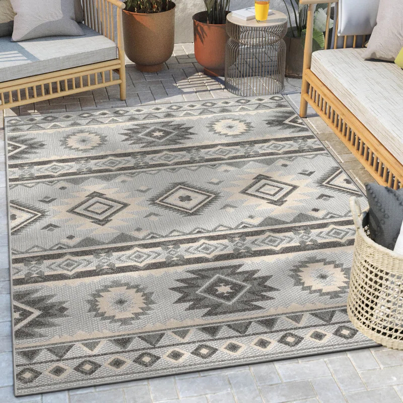 Ebern Designs Dickenson Mamba Geometric Grey Indoor/Outdoor Hi-Lo Area Rug