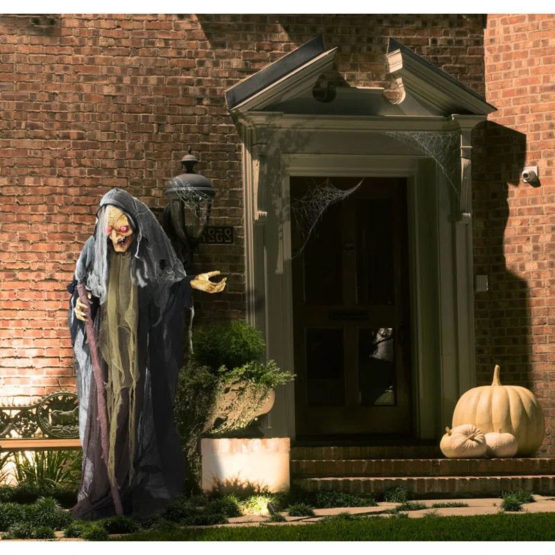 Haunted Hill Farm Life-Size Poseable Witch with Lights and Sound, Indoor/Covered Outdoor Halloween Decoration