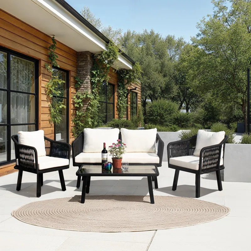 Highland Dunes Orme 4 Piece Rattan Sofa Seating Group with Cushions & Reviews | Wayfair