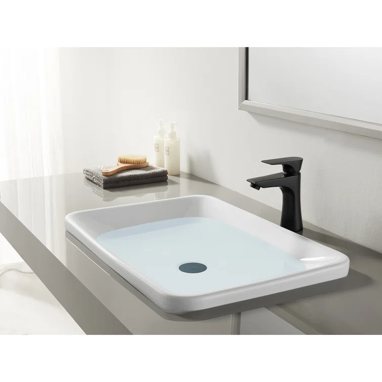 Kingston Brass Millennium Single Hole Bathroom Faucet with Drain Assembly LS4220XL