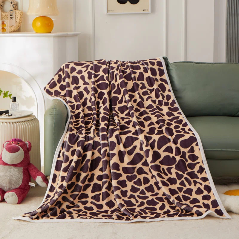 Kindred Home Lightweight Flannel Fleece Leopard Print Throw Blanket for Couch, Bed, Holiday Decor (60x80 Inches)