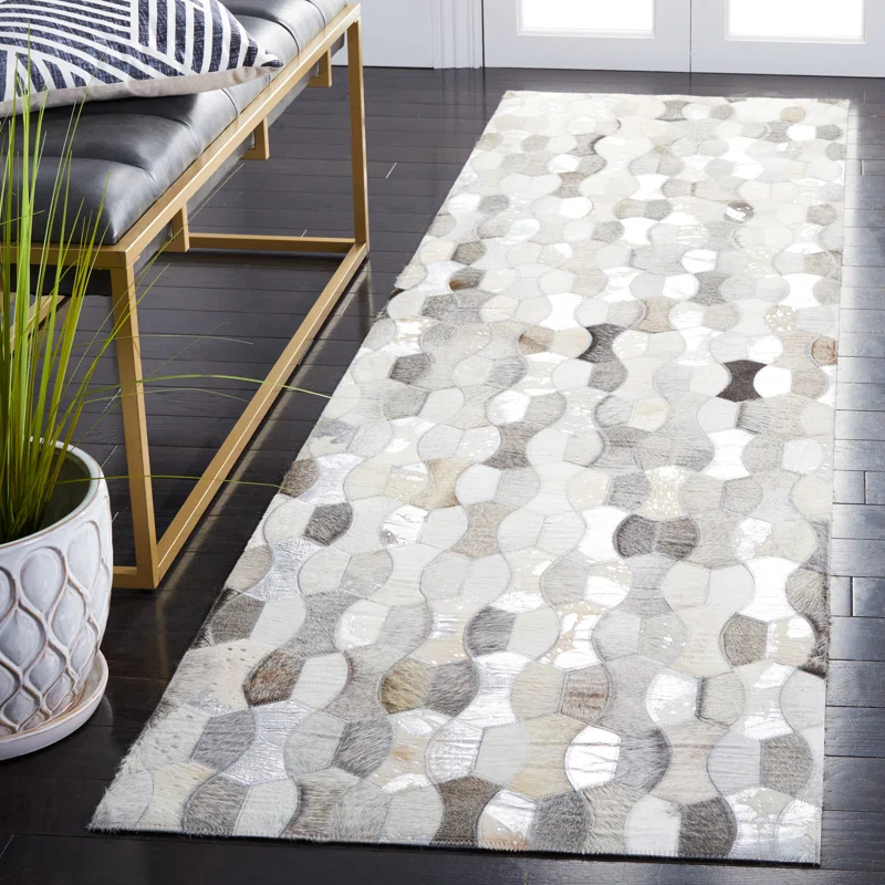Loon Peak® Belday Flat Weave Hair On Leather Rug
