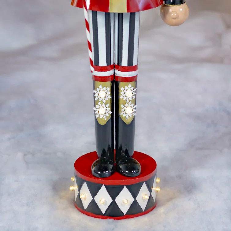 The Holiday Aisle® Large Iron Christmas Nutcracker "Harry" with Candy Cane