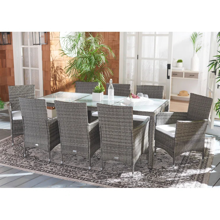 Safavieh Hailee 8 - Person Wicker Patio Dining Set with Rectangular Table , Cushions Included