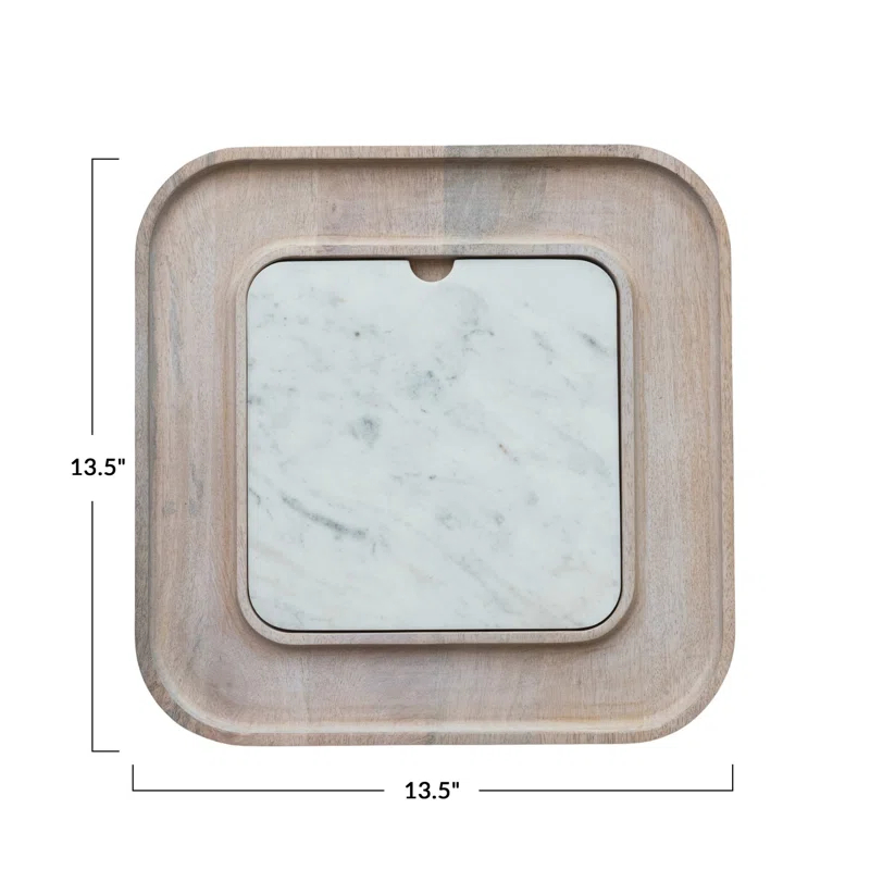 Creative Co-Op Marble And Wood Cutting Board On A Dish