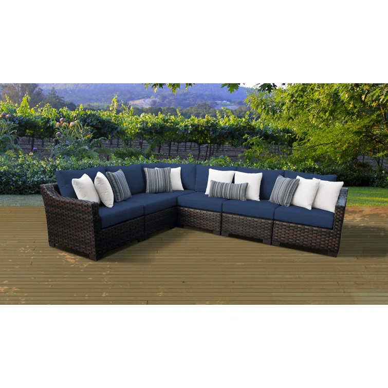 kathy ireland Homes & Gardens by TK Classics 126'' Wide Wicker Patio Sectional with Cushions