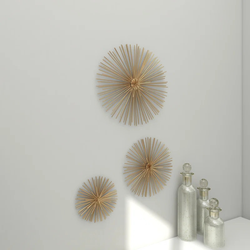 CosmoLiving by Cosmopolitan Gold Metal Starburst 3D Short Spike Home Wall Decor, Set of 3 6", 9", 12"W