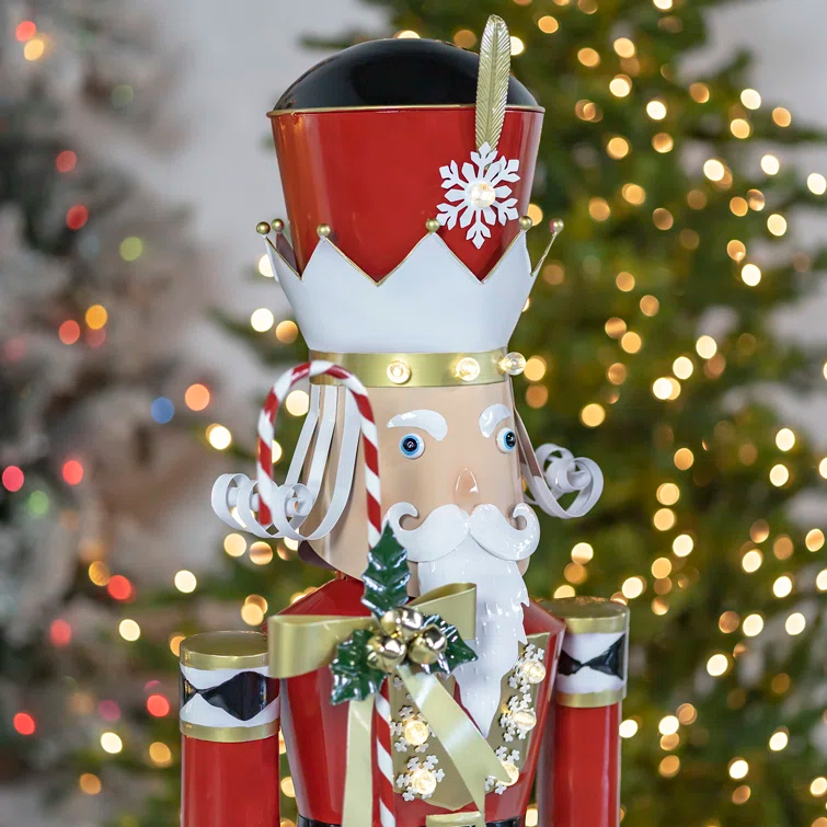 The Holiday Aisle® Large Iron Christmas Nutcracker "Harry" with Candy Cane