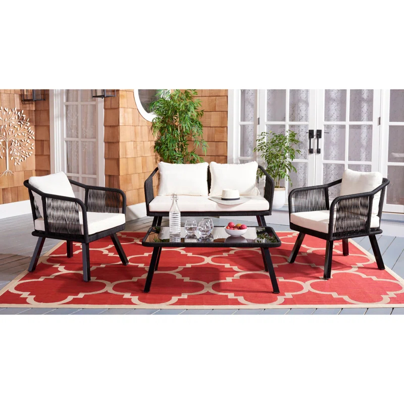 Highland Dunes Orme 4 Piece Rattan Sofa Seating Group with Cushions & Reviews | Wayfair